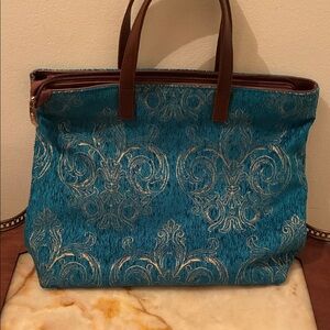 Chic Teal and gold patterned bag.  Brand new.  Excellent condition!